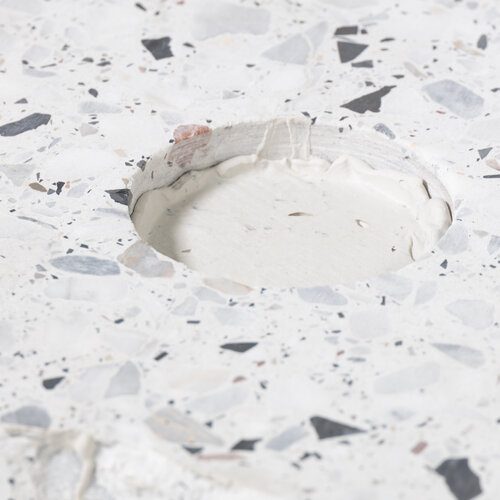 Kunststein repariert